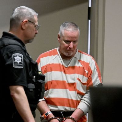 Father who gifted gun to son before he carried out deadly high school shooting jailed for 15 years